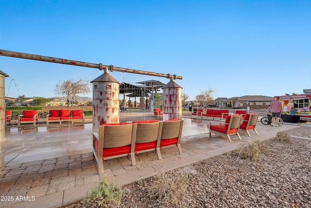 surrounding community with a patio