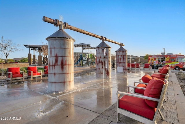 view of patio / terrace featuring playground community