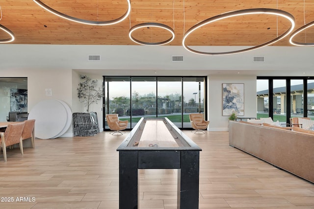 rec room featuring wooden ceiling, visible vents, and light wood-style flooring