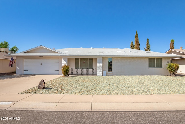 single story home featuring a garage