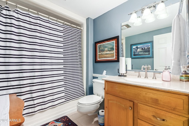 full bathroom with shower / bath combo, tile patterned floors, vanity, and toilet