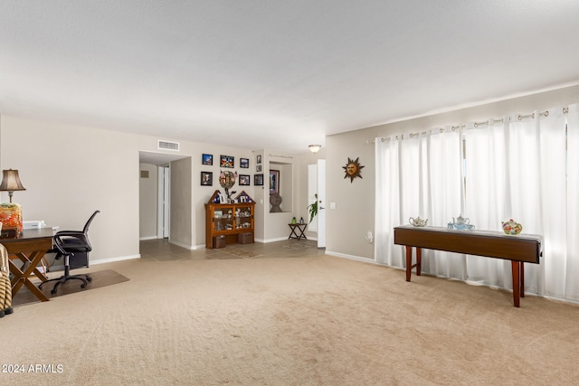 office space with light colored carpet