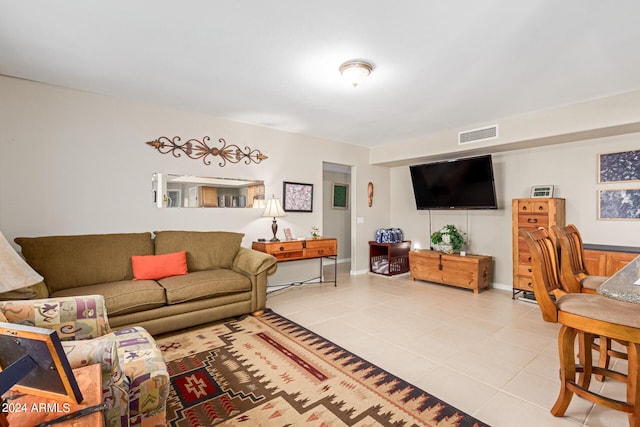 living room featuring light tile patterned flooring