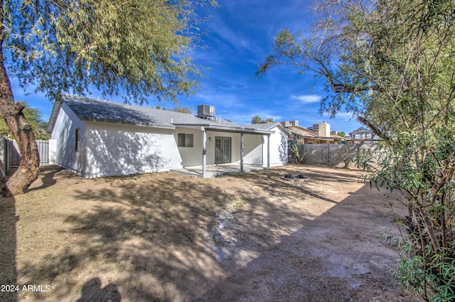 back of house featuring a patio area and central AC