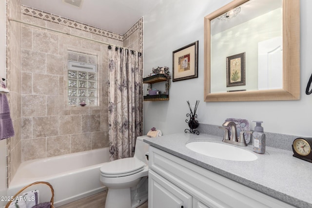 bathroom with toilet, vanity, shower / bath combination with curtain, and wood finished floors