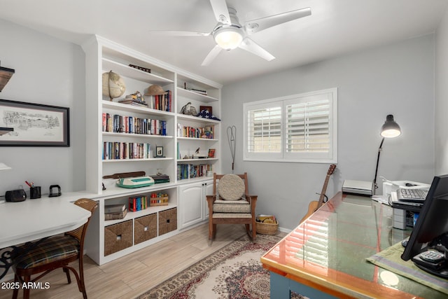 office featuring a ceiling fan and wood finished floors
