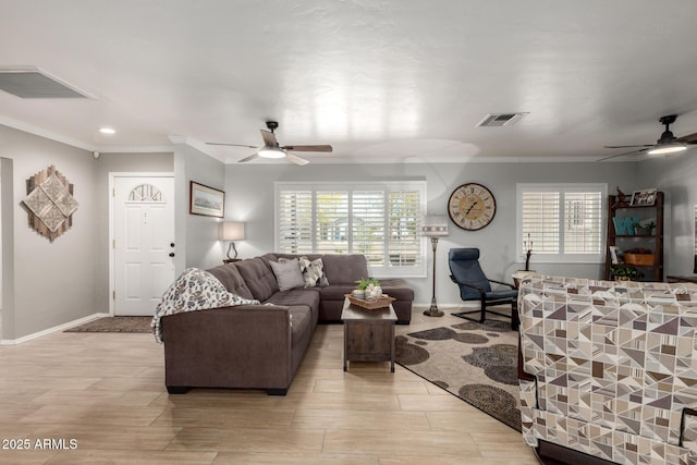 living room with a ceiling fan, crown molding, baseboards, light wood-style flooring, and recessed lighting