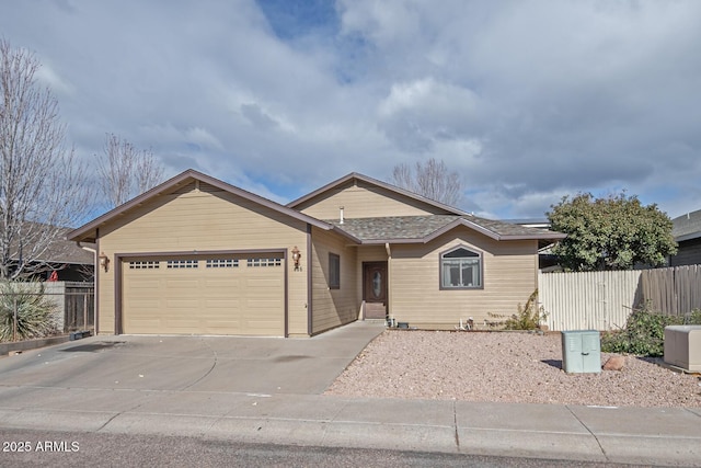 ranch-style house featuring a garage