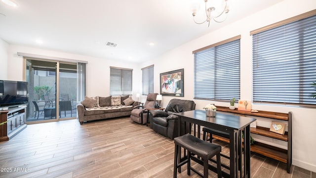 living room featuring a chandelier