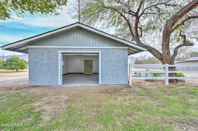 garage featuring fence