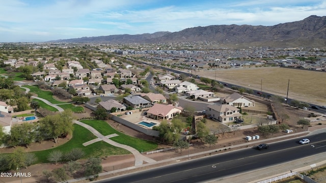 birds eye view of property with a residential view and a mountain view