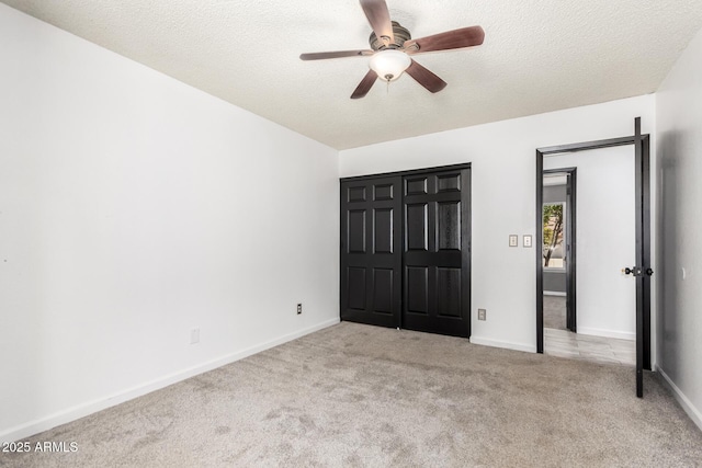 2109 E Gelding Dr, Phoenix, AZ 85022 - unfurnished bedroom featuring carpet flooring, a textured ceiling, and a ceiling fan