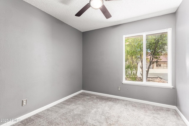 2109 E Gelding Dr, Phoenix, AZ 85022 - carpeted empty room with a ceiling fan and a textured ceiling