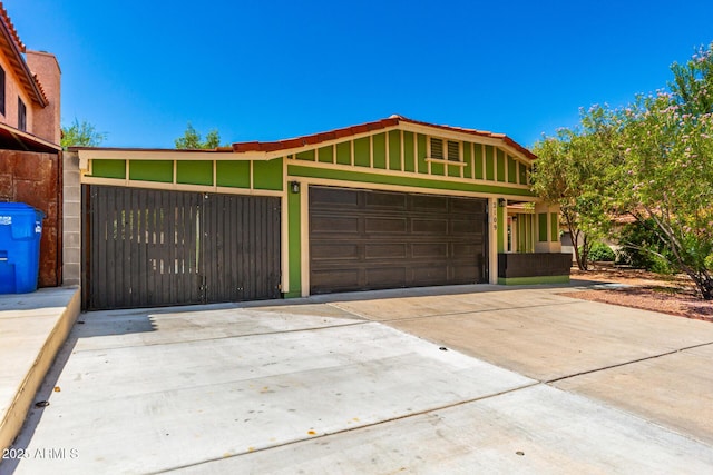 2109 E Gelding Dr, Phoenix, AZ 85022 - view of front of property with concrete driveway and a garage