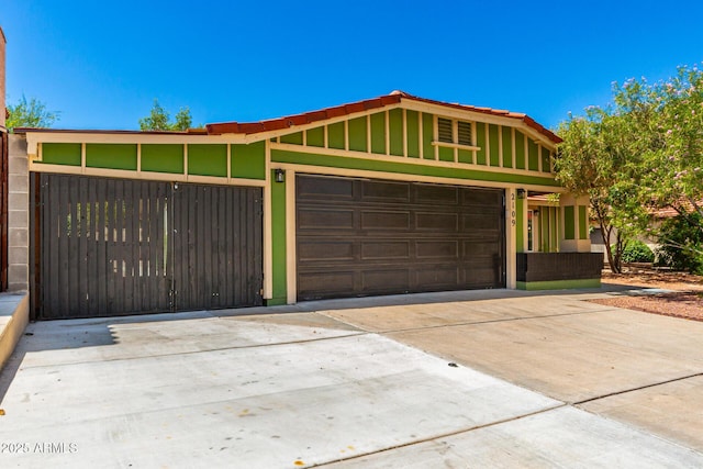 2109 E Gelding Dr, Phoenix, AZ 85022 - view of front of property featuring driveway and a garage