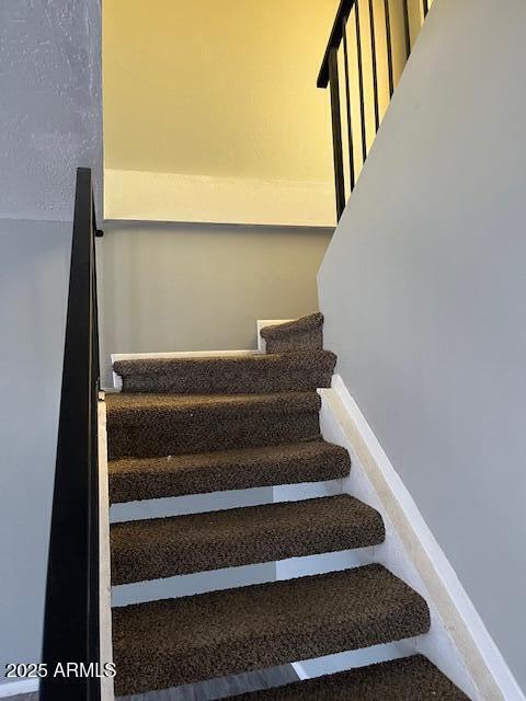 staircase with baseboards