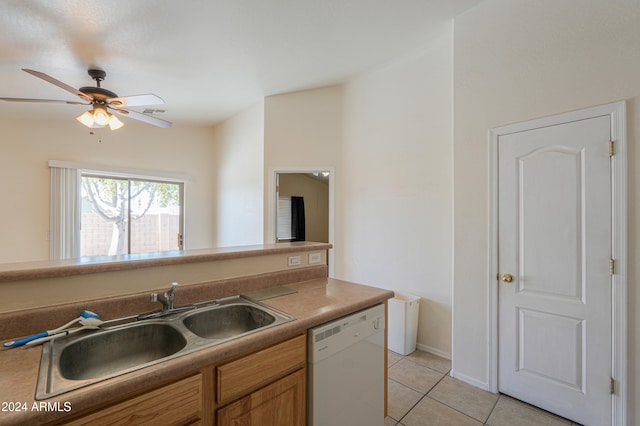 kitchen with ceiling fan, sink, white dishwasher, and light tile patterned floors