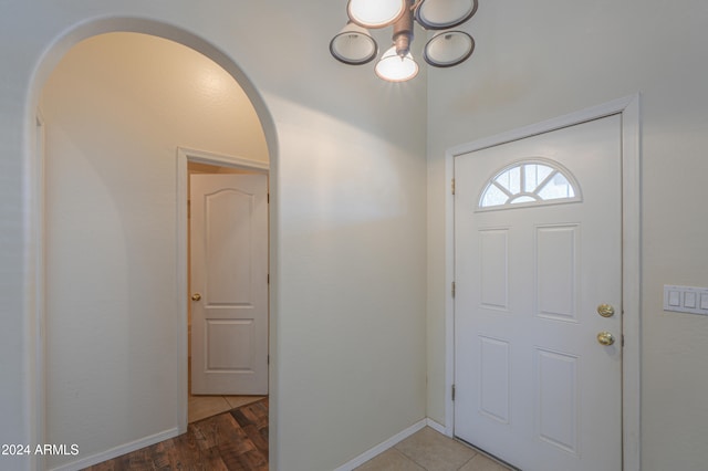 entryway with hardwood / wood-style flooring