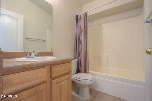 full bathroom featuring vanity, shower / bath combination with curtain, toilet, and tile patterned floors