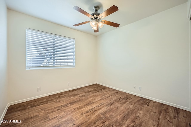 unfurnished room featuring ceiling fan and wood-type flooring