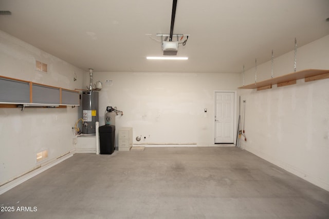 garage with a garage door opener and gas water heater