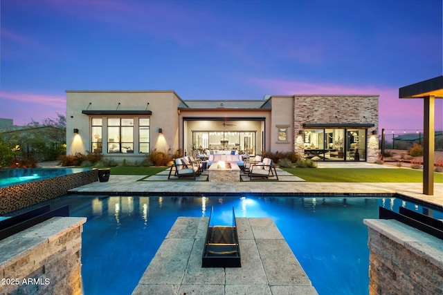 26690 N 119th St, Scottsdale, AZ 85262 - back of property featuring an outdoor pool, a patio, an outdoor living space, stucco siding, and a yard