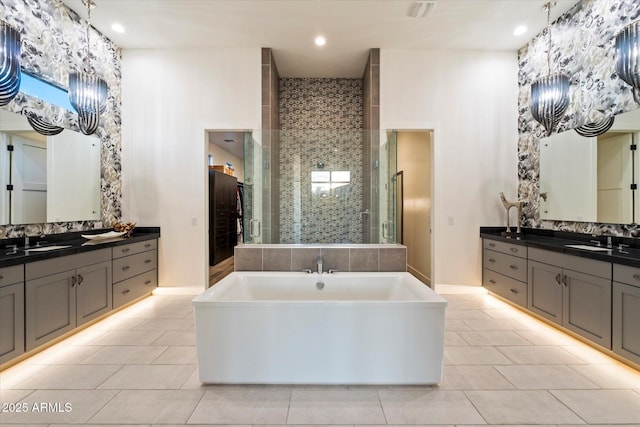 26690 N 119th St, Scottsdale, AZ 85262 - full bathroom featuring tile patterned floors, a sink, a stall shower, a freestanding bath, and two vanities