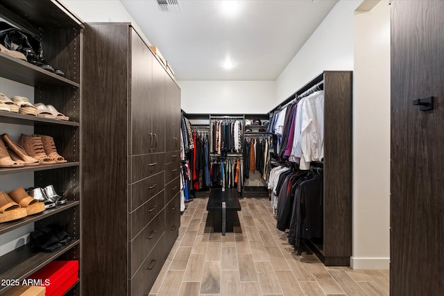26690 N 119th St, Scottsdale, AZ 85262 - spacious closet featuring wood tiled floor and visible vents