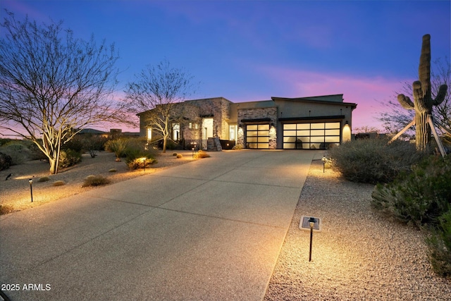 26690 N 119th St, Scottsdale, AZ 85262 - view of front of property featuring stone siding, stucco siding, concrete driveway, and a garage