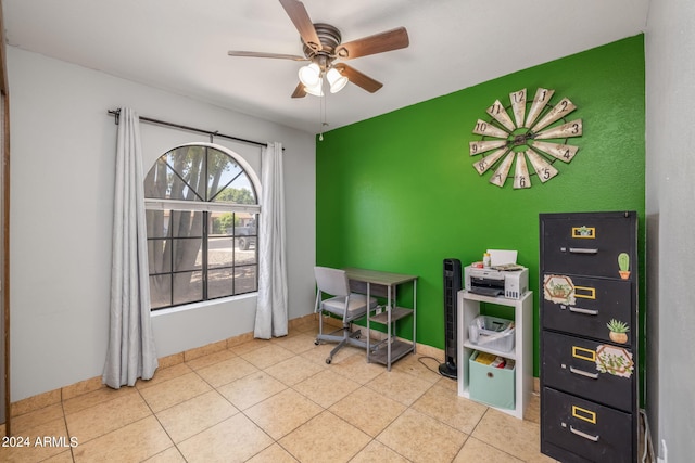 tiled office space with ceiling fan