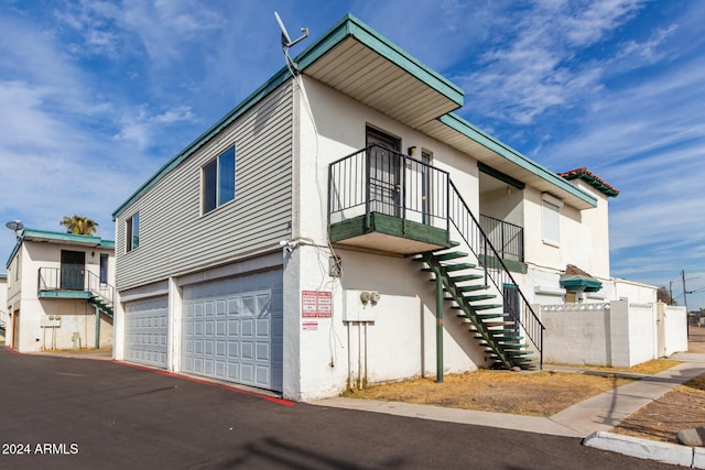 view of front of home with a garage