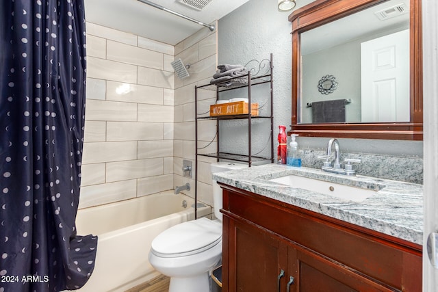 full bathroom with hardwood / wood-style floors, shower / tub combo with curtain, vanity, and toilet