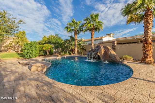 view of swimming pool with a fenced in pool, a patio area, and fence