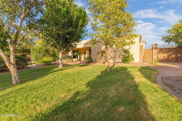 view of yard featuring a gate and fence