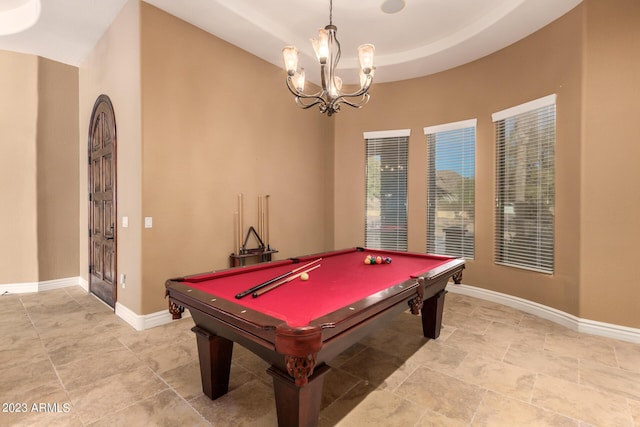 playroom with a raised ceiling, an inviting chandelier, billiards, and baseboards