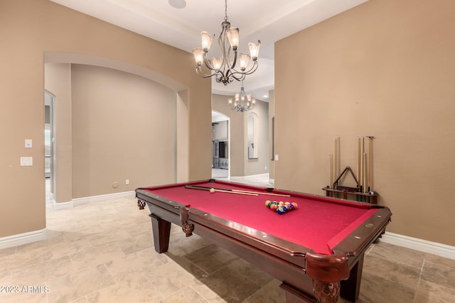 recreation room with baseboards, arched walkways, and pool table