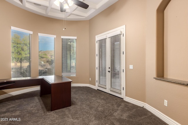 office space with baseboards, coffered ceiling, beamed ceiling, and dark colored carpet