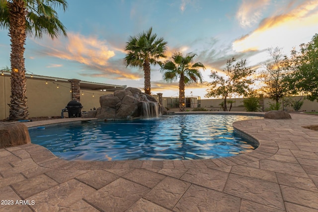 view of pool featuring a fenced in pool, a patio area, and a fenced backyard