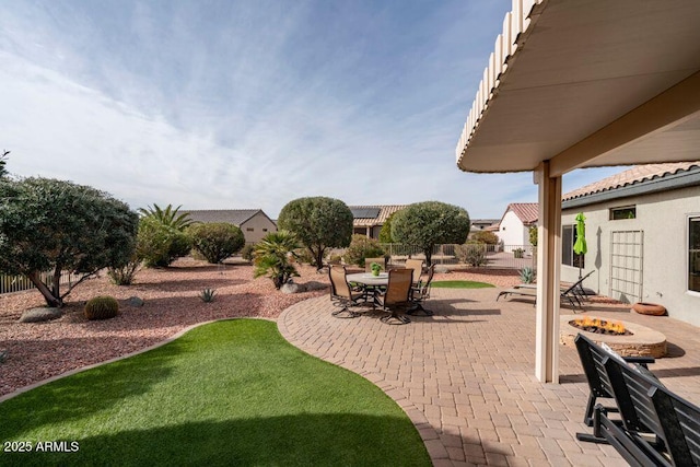 view of patio featuring an outdoor fire pit