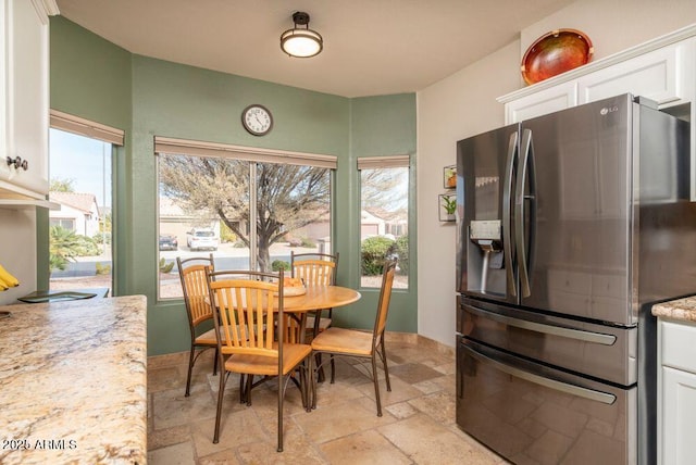 dining area with a healthy amount of sunlight