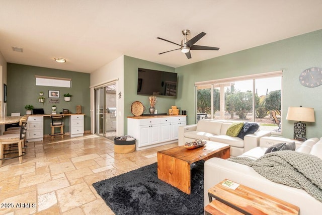 living room featuring ceiling fan