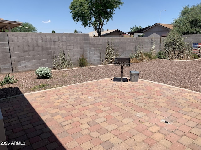 108 E Jasmine St, Mesa, AZ 85201 - fenced backyard featuring a patio area
