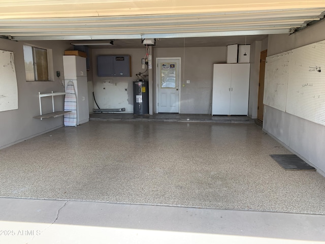 108 E Jasmine St, Mesa, AZ 85201 - garage featuring electric water heater, a garage door opener, and baseboards