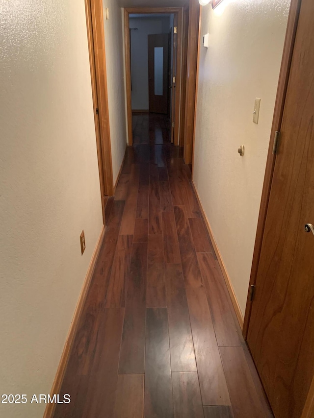 108 E Jasmine St, Mesa, AZ 85201 - hallway with wood-type flooring and baseboards