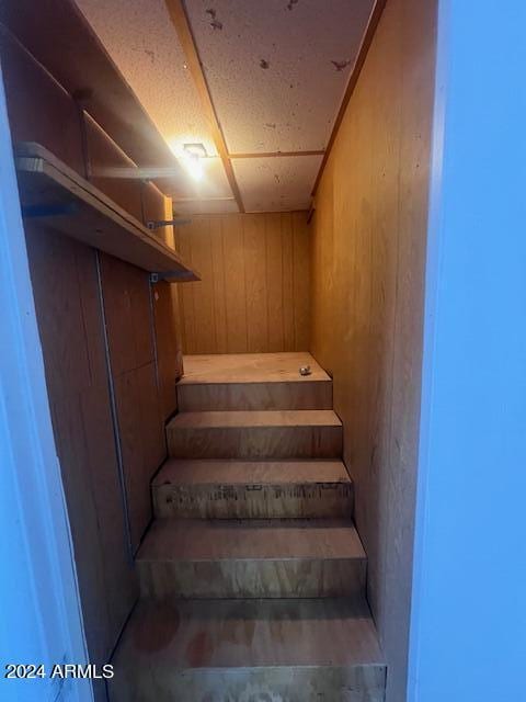 4332 W Ocotillo Rd Unit 206, Glendale, AZ 85301 - stairs featuring wooden walls