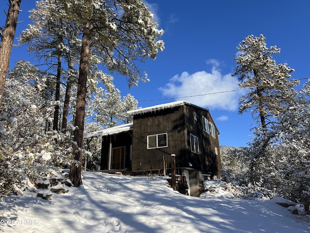 view of snow covered property