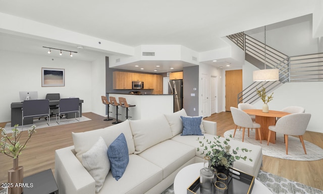 living room with light wood-type flooring