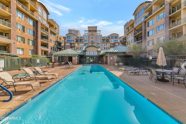 view of swimming pool with a gazebo and a patio area