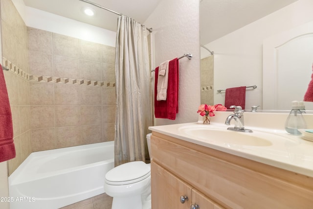 full bathroom featuring vanity, tile patterned floors, toilet, and shower / bathtub combination with curtain