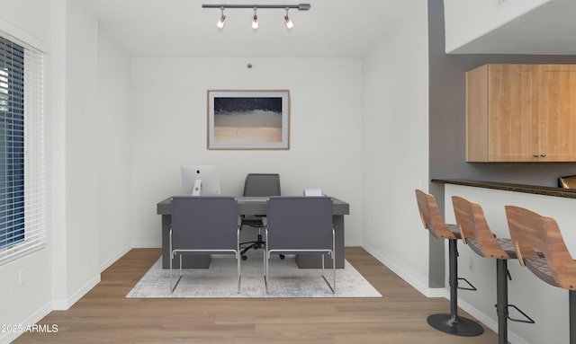 office area with hardwood / wood-style floors